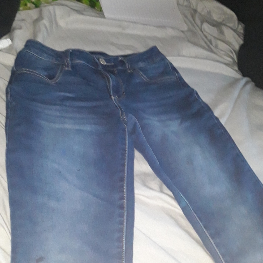 Dark washed blue jeans